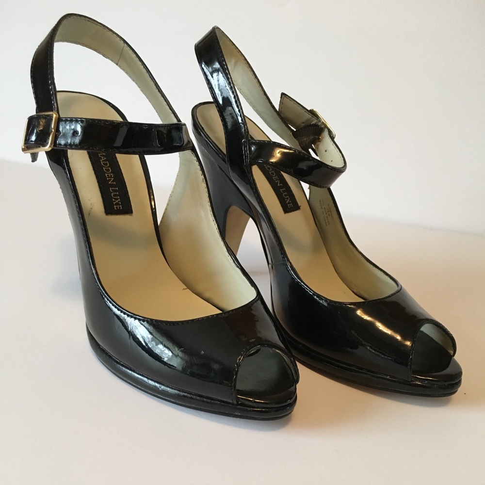 Steve Madden black patent leather peep-toe heels.